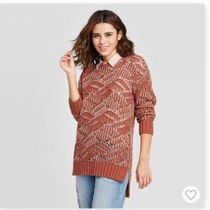Universal thread stitch tunic sweater